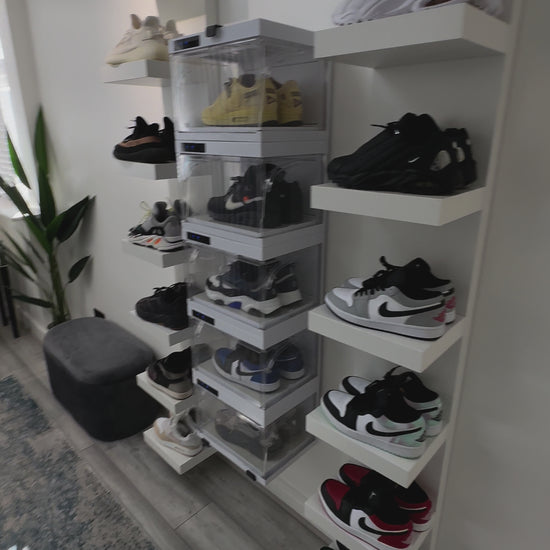 Sneakerwall display with remote controlled sneaker cases
