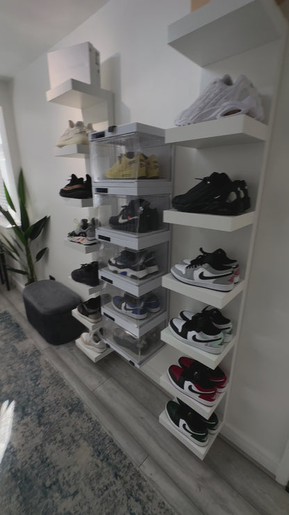 Sneakerwall display with remote controlled sneaker cases